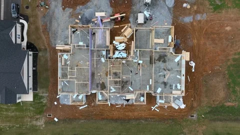 Foundation of a house under construction. Birds eye view of partially Vídeo Stock 240972306