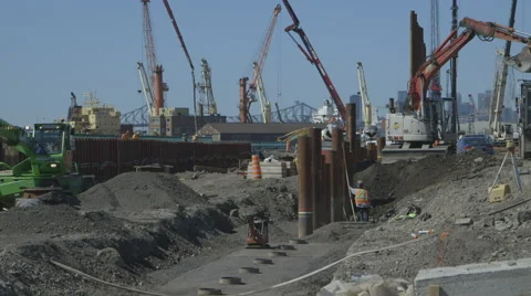 Foundation piles being installed Video stock 65052258