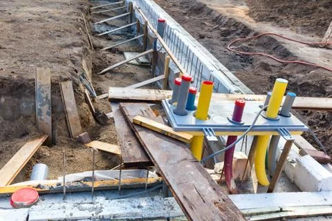 Foundation with pipes on construction site Stock Photos