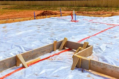 Foundation preparation for new construction project area at construction site Stock Photos