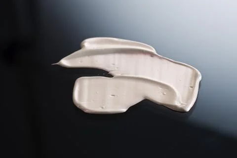 Foundation texture with black background. Stock Photos