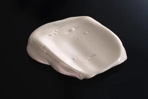 Foundation texture with black background. Stock Photos