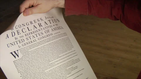 Founding Father holds &amp; reads the Declaration of Independence, July 4th Stock Footage 148421625