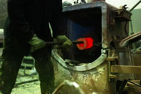 Foundry - casting non-ferrous metals in centrifugal metallurgical furnace Stock Photos