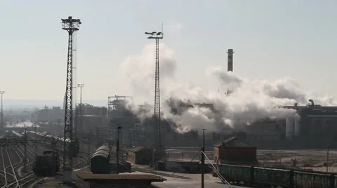 Foundry chimneys and trains Stock Footage 6371271