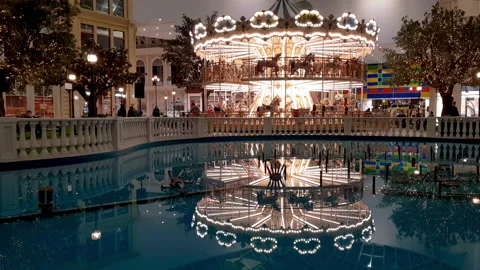 Fountain against the background of the carousel Stock Footage 166077747