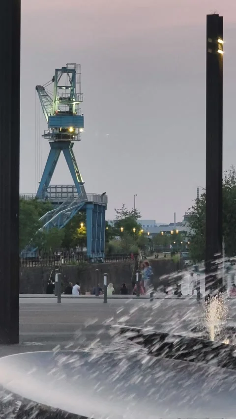 Fountain and Blue Harbor Crane in Offenbach am Main on a Summer Day (Vertical) Stock-Footage 341471257