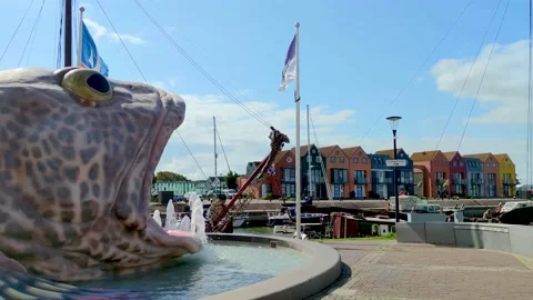 Fountain and a harbor in the centrum of dutch city Stavoren, Province Friesland Stock Footage 164590889