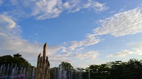 Fountain and Monument at Sunset with Cloudy Sky Background Stock Footage 309842922
