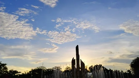 Fountain and Monument at Sunset with Cloudy Sky Background Stock Footage 309843126