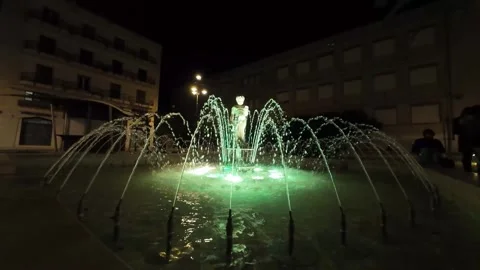 Fountain in central square at Ispica, Sicily by night slow-motion 스톡 동영상 296582699