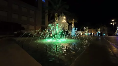 Fountain in central square at Ispica, Sicily by night slow-motion 스톡 동영상 296588626