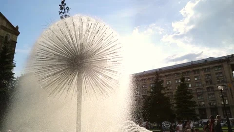 Fountain - dandelion in the rays of the summer sun Stock Footage 104901754