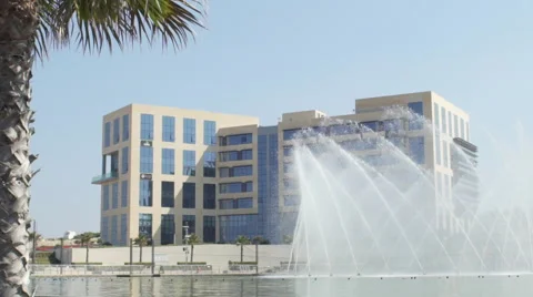 Fountain display in front of  modern building - slow motion Stock Footage 66589054