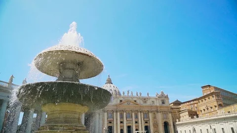 Fountain at the dome of the Basilica of St. Peter. Vatican City. Slow mo camera Stock Footage 107836782