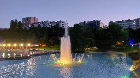 Fountain in the evening Stock Photos