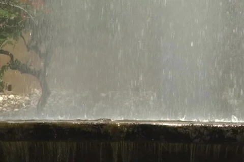 Fountain falling droplets slow mo Stock Footage 701277