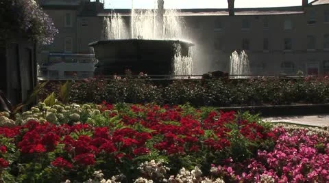 Fountain with flowers UK Stock Footage 11633960