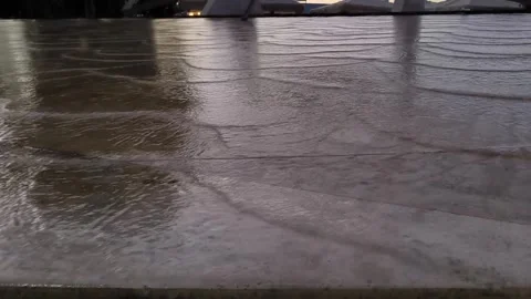 Fountain with flowing drops of water flows smoothly. Video stock 326209939