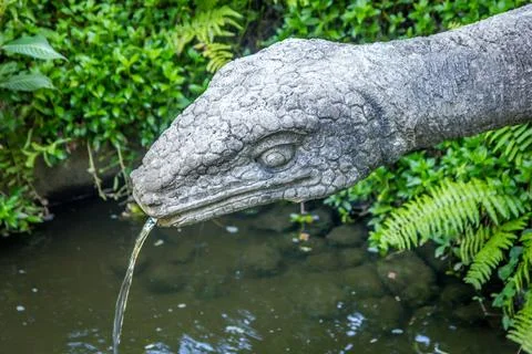 Fountain in form of snake in the Monkey Forest in Bali, Indonesia Stock Photos