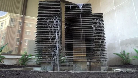 Fountain in front of building Stock Footage 76747408