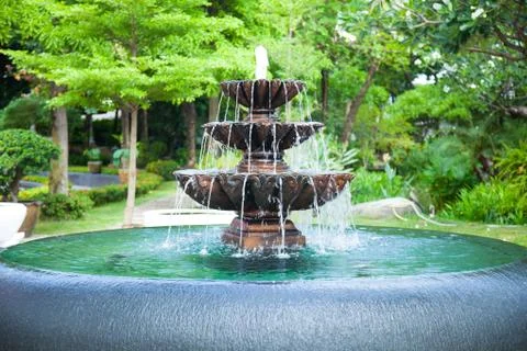 Fountain in the garden. Stock Photos