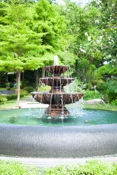 Fountain in the garden. Stock Photos