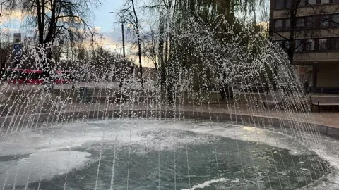 Fountain with ice in Vilnius at Washington square Stock Footage 257351390