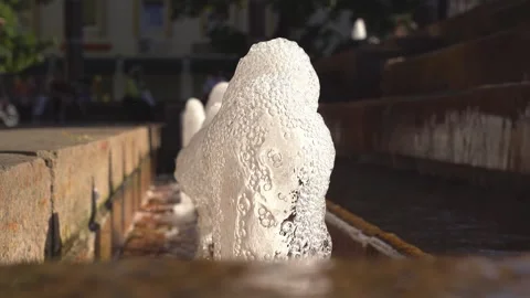Fountain jet bubbles with many bubbles, low wide-jet urban fountain. Stock Footage 248598879
