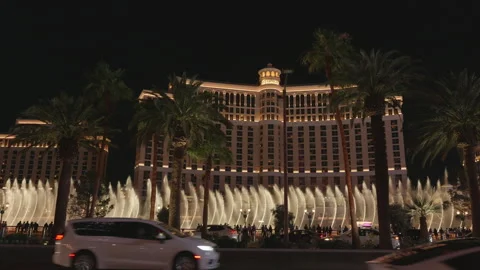 Fountain light show at night in front of the Bellagio hotel. Las Vegas, USA. Stock Footage 283638598