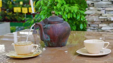 A fountain made of cup and tea pot 库存影片 68176197