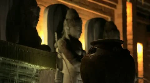 Fountain by night with buddha Stock Footage 22268992