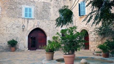 Fountain at an old stone house. Spain. Stock Footage 86474067