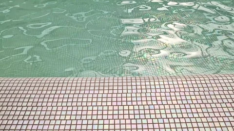 Fountain or pool. The surface is lined with small tiles and clear water 스톡 동영상 250264655