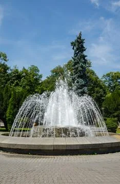 Fountain in a park Stock Photos