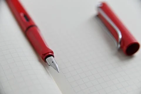 Fountain Pen On Notebook Stock Photos
