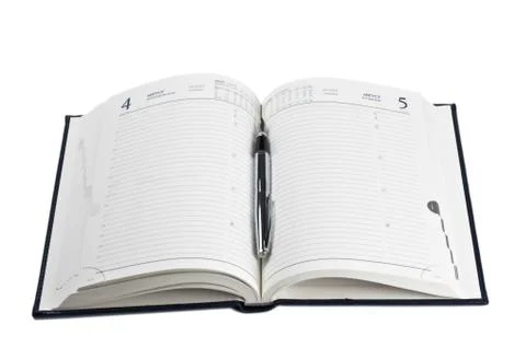 Fountain pen on opened diary Stock Photos