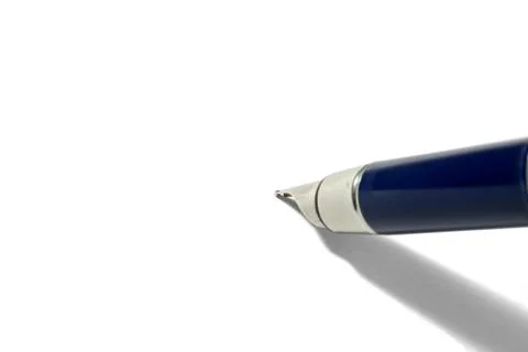 A fountain pen ready to write on white paper with copy space. Photos