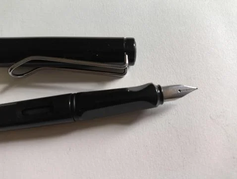 Fountain pen on the table Stock Photos