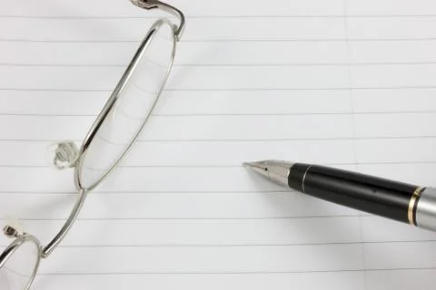 Fountain pen,notepad &amp; glasses Stock Photos