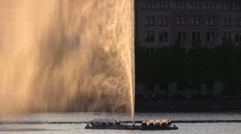 Fountain on a pond in the sunlight Stock Footage 38830410