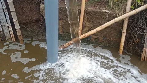 Fountain from the pool drainpipe to keep water levels stable even Stock Footage 232111391