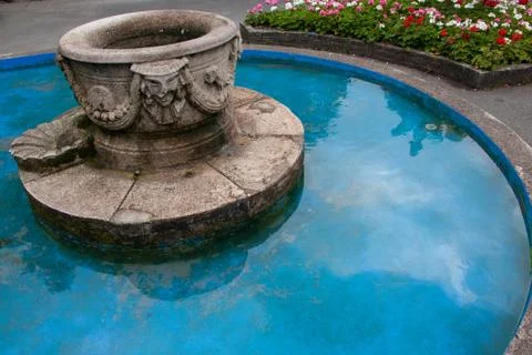 Fountain in a pool Stock Photos