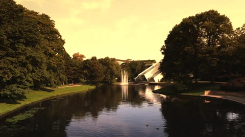 Fountain on a quiet river in the park Stock Footage 35257690