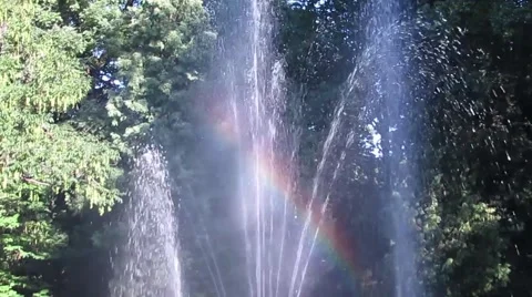 Fountain with a rainbow in the park Stock Footage 53299925