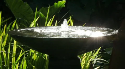 Fountain with reflecting sunlight Stock-Footage 462615
