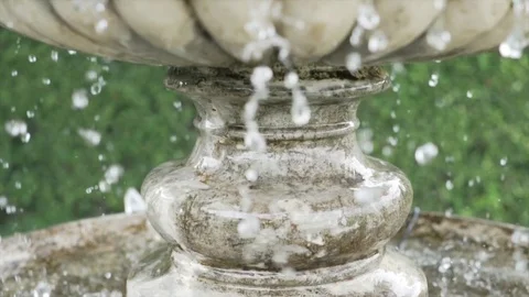 Fountain, slow motion of dropping water in classic fountain in the garden Stock Footage 119329916