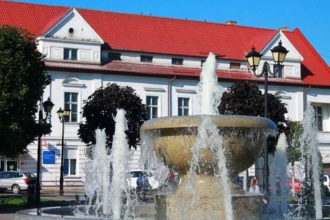 Fountain in a small town square Stock Photos
