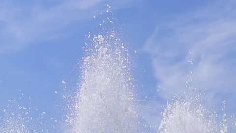 Fountain splashes against the blue sky. Fountain in the park Stock Footage 240748726