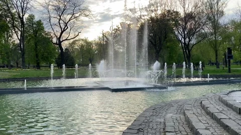 Fountain in the spring park. In the evening. Stock Footage 192459428